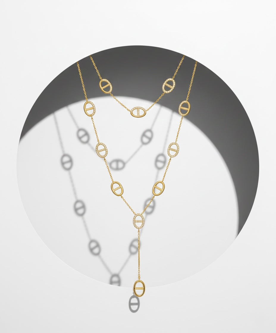 Chunky gold chain necklace with charms heart star and evil eye details