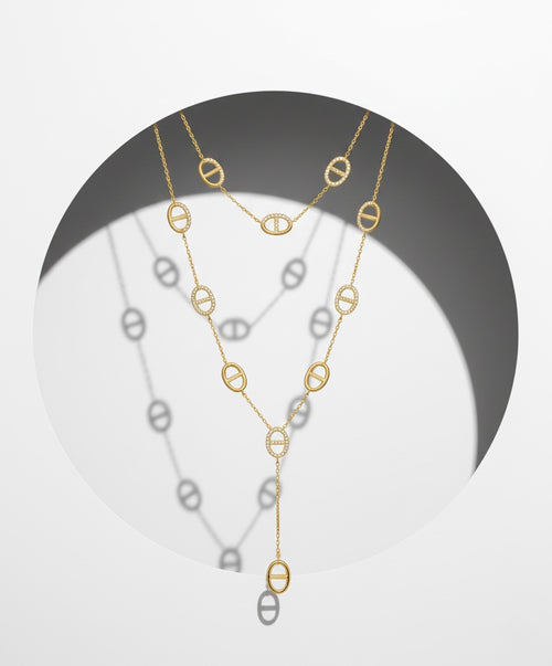 Chunky gold chain necklace with charms heart star and evil eye details